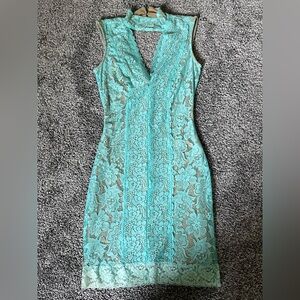 XXS Bebe bodycon lace mini dress mint green and nude. Gently used